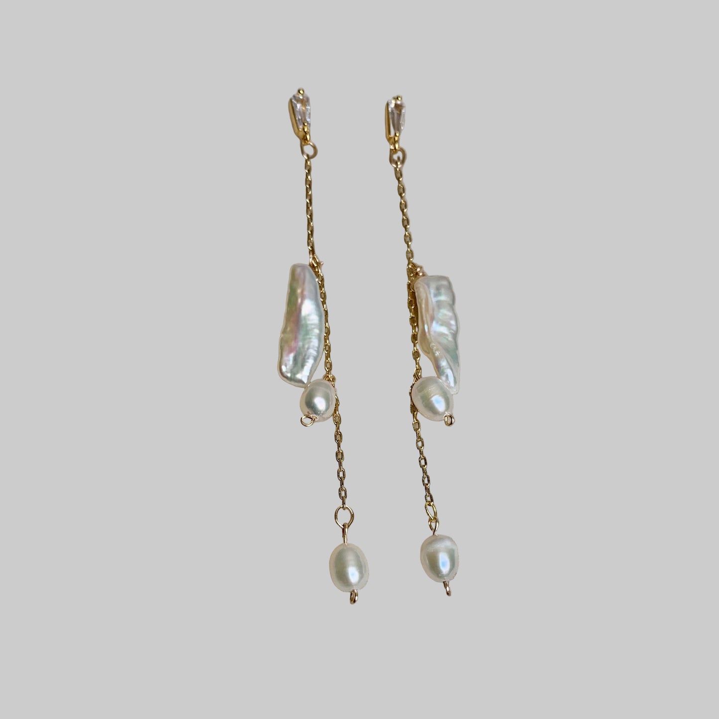 Baguette, Biwa Pearls and freshwater pearls on neutral background.
